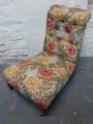 A nursing chair upholstered in William Morris fabric