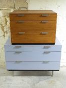 A painted chest of three drawers and a similar smaller teak example,