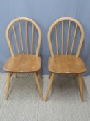 Two Ercol light elm dining chairs