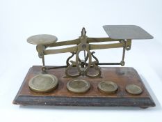 19thC set of brass postage scales with weights to base