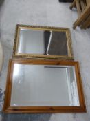 Two bevelled glass mirrors,