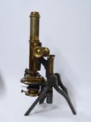 Baker 19thC cased microscope with extra lenses,