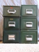 Six small office filing drawers,