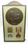 British Army WWI medal pair comprising War Medal and Victory Medal framed with the death plaque for