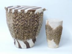 African zebra hide drum and a smaller antelope hide shaker drum. Collected by L. J.