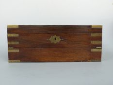 A 19thC mahogany campaign writing slope formerly the property of Brigadier General DJT (Bull)
