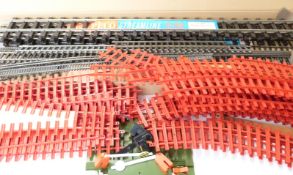 Nineteen Lima and similar 0 gauge locomotives, coaches and wagons including Blue Flyer,