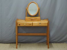 A pine dressing table and mirror,