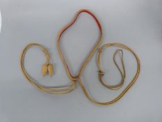 Victorian c1850 16th Lancers officer's body lines, gold cord with red cloth lining.