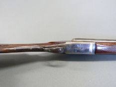 Essex 12 bore side by side shotgun with engraved scene of dogs to the chrome plated locks,