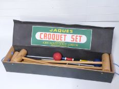 Jacques four person croquet set in original box.