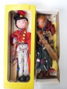 Two Pelham puppets Fritzl and one other, both in boxes.