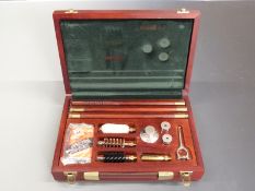 Parker Hale 12 bore gun cleaning kit and accessories in fitted mahogany box