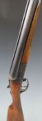 Jabali 12 bore side by side shotgun with named lock, chequered grip and forend,