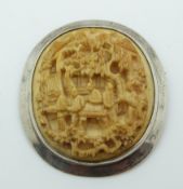 A silver brooch set with a carved Chinese ivory plaque, 4.