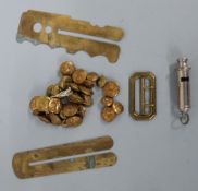 A collection of brass RAF buttons together with button slides and ACME city whistle