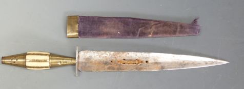 A brass handled knife or dagger with pierced double edged steel blade,