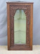 Carved oak glazed corner cupboard