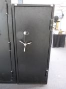 A 24 gun safe / cabinet with two keys,