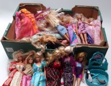 Approximately thirty Barbie dolls of differing ages