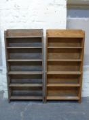 A pair of Arts & Crafts oak waterfall bookcases, by repute Sir Giles Gilbert Scott,