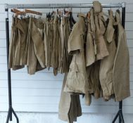 A collection of British Army Tropical uniform including thirteen pairs of shorts three pairs of
