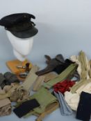 A collection of military items to include three pairs of puttees, seven pairs of socks,