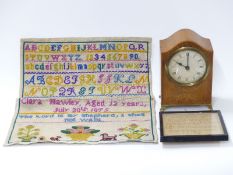 A wooden mantel clock,