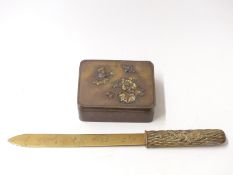 Japanese Meiji period box with relief gilt decoration of a bird and floral sections and a Japanese