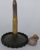 A trench art lighter made from a 1914-18 Medal and Victory Medal named to A Hayden GSR, M.F.