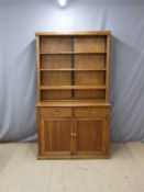 Oak dresser with plate rack to top and two drawers and two cupboards to base,