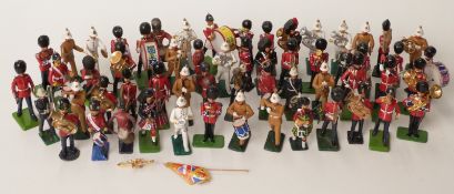 Fifty-seven Britains and similar diecast metal and lead military bandsmen
