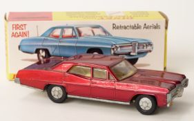 Dinky Toys diecast model Pontiac Parisienne with burgundy body, lemon interior and cast hubs 173,