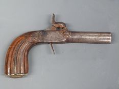 Belgian percussion hammer action pocket pistol with engraved lock and top plate, carved grip,