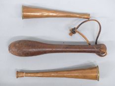 Two copper hunting horns and a treen turned cosh,