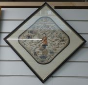 A late 19thC Chinese embroidered silk panel depicting a dragon and a man, framed,