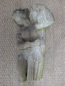 A reconstituted stone figure of a lady with robe and a water feature
