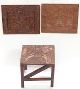 Benin carved table, 33 x 28 x 36cm, and two plaques,