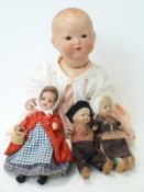 Four dolls comprising two composite dolls one marked 'R Germany 12/0' the other 'British Dollies 5'