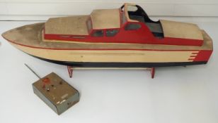 Vintage remote control wooden model boat with Taplin twin cylinder diesel engine and radio handset,