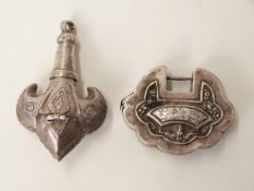 Chinese 18th/19thC white metal Ruyi lock and a white metal Eastern pendant