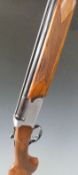 AV Maroccini Mistral 12 bore over and under shotgun with scenes of dogs and birds engraved to the