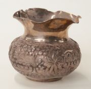 Eastern silver vase with decoration depicting harvesting,