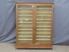 A pine display cabinet 111 x 92cm