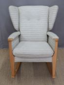 Parker Knoll wing back rocking chair, model 188-1126,