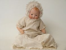 Armand Marseille bisque headed doll with open mouth, weighted blue eyes,