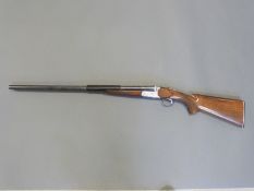 Zabacola Jabali 12 bore side by side ejector shotgun with heavily engraved chromed locks,