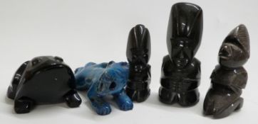 Five tribal stone carvings