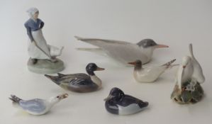 A group of seven Copenhagen figures including lady with goose, ducks,
