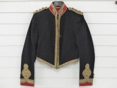 A c1908 Yorkshire Artillery officer's mess jacket of black cloth with red collar and cuffs,